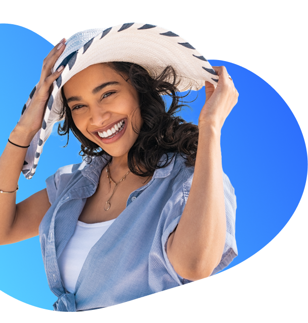 Smiling woman in hat who has secured a boat loan through Financfy